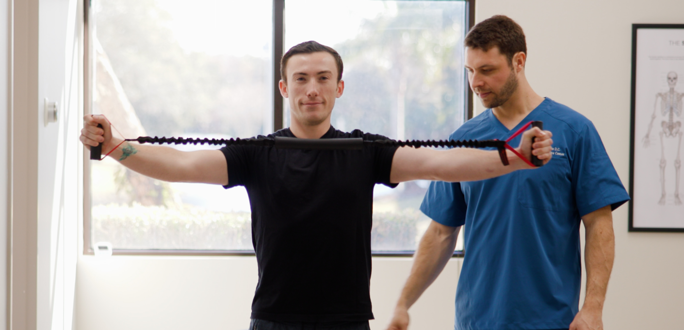 A patient doing rehabilitation exercise at Ponte Vedra Spine Center.