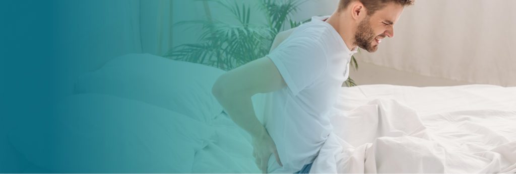 A man in extreme lower back pain.
